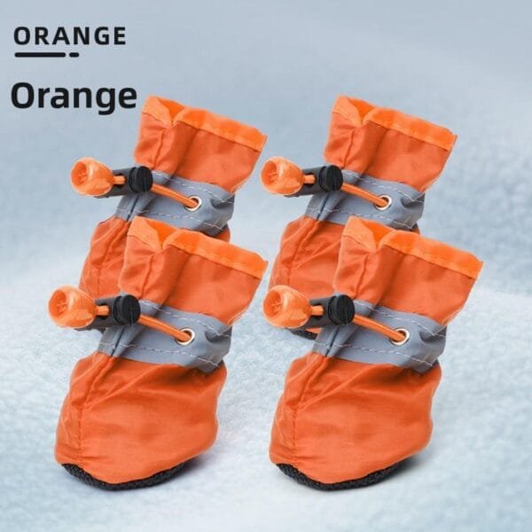 Orange soft fleece-lined dog boots showing warm interior 11