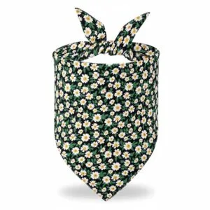 close-up of stitching and fabric on dog bandanas dark green floral design close-up of stitching and fabric on dog bandanas dark green floral design