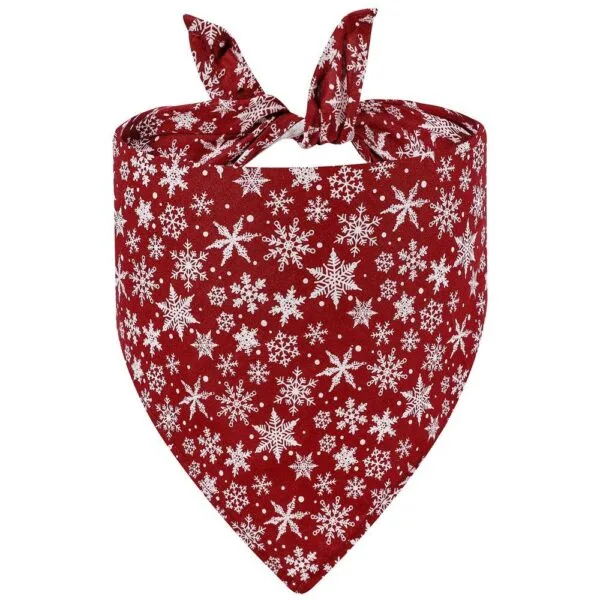 close-up of red snowflake Christmas dog bandana fabric and stitching close-up of red snowflake Christmas dog bandana fabric and stitching