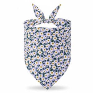 close-up of fabric and stitching on dog bandanas purple floral design close-up of fabric and stitching on dog bandanas purple floral design