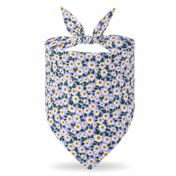 close-up of fabric and stitching on dog bandanas purple floral design close-up of fabric and stitching on dog bandanas purple floral design