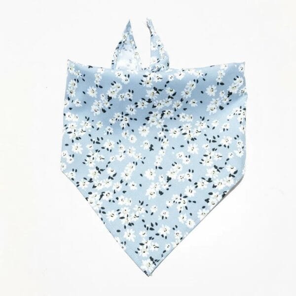 close-up of fabric and stitching on dog bandanas blue floral print